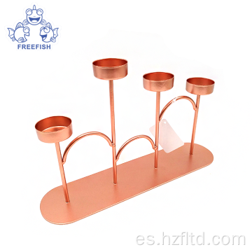 Juego de candelabros de metal dorado rosa con 4 brazos